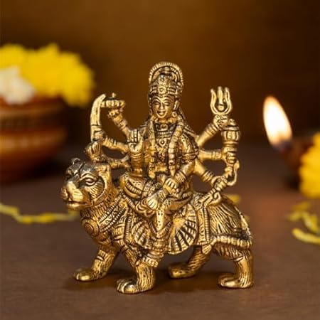 Shree AAASHIRWAD Pure Brass Durga Maa Idol, which is a Durga MATA Murti Pure Brass. It's Intended for Home Decor, puja Rooms, and can Also be Placed on an Office Desk or in a car